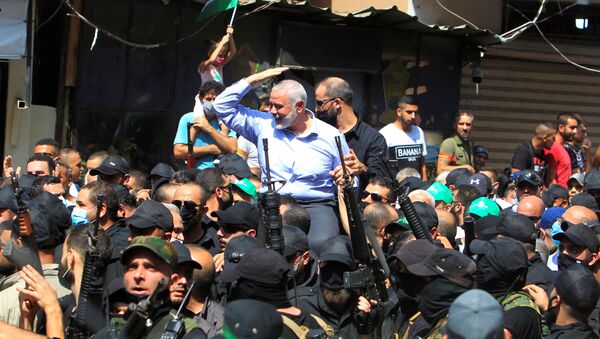 Palestinian group Hamas' top leader, Ismail Haniyeh, gestures as he is carried during his visit at Ain el Hilweh Palestinian refugee camp in Sidon, Lebanon September 6, 2020 - Sputnik International