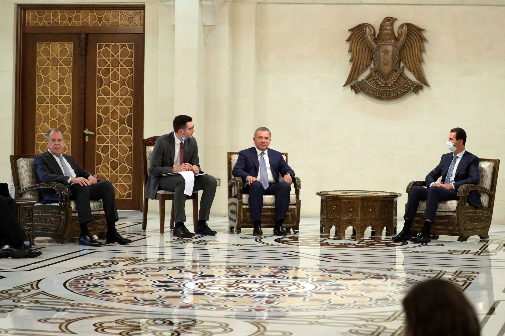 Russia's Deputy Prime Minister Yuri Borisov (C) and Foreign Minister Sergei Lavrov (L) meet with Syrian President Bashar al-Assad (R) in Damascus on September 7, 2020 - Sputnik International, 1920, 15.07.2022