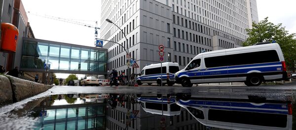 A view of police vehicles outside the Charite Mitte Hospital Complex, where Russian opposition leader Alexei Navalny is receiving medical treatment, in Berlin, Germany 24 August 2020. A view of police vehicles outside the Charite Mitte Hospital Complex, where Russian opposition leader Alexei Navalny is receiving medical treatment, in Berlin, Germany 24 August 2020. - Sputnik International