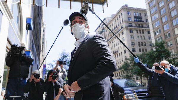 Michael Cohen arrives at his Manhattan apartment, Thursday, May 21, 2020, in New York. President Donald Trump's longtime personal lawyer and fixer was released federal prison Thursday and is expected to serve the remainder of his sentence at home. Cohen has been serving a federal prison sentence at FCI Otisville in New York after pleading guilty to numerous charges, including campaign finance fraud and lying to Congress.  - Sputnik International