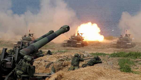 FILE PHOTO: A CM-11 Brave Tiger tank fires during the live fire Han Kuang military exercise, which simulates China's People's Liberation Army (PLA) invading the island, in Pingtung, Taiwan May 30, 2019 - Sputnik International