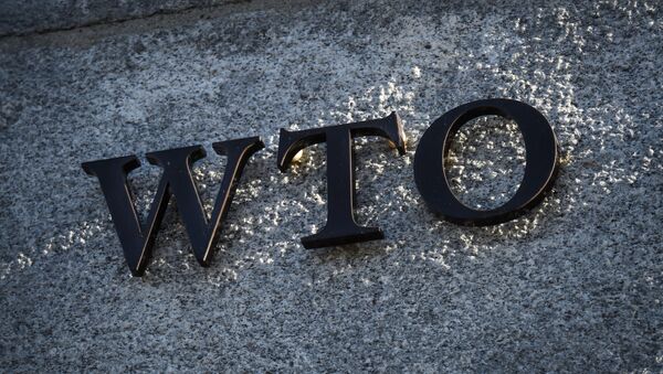 A sign of the World Trade Organization (WTO) is seen at the trade intergovernmental organization headquarters in Geneva on December 10, 2019. - Sputnik International