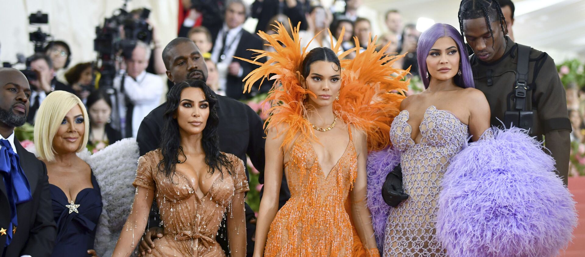 Corey Gamble, from left, Kris Jenner, Kim Kardashian, Kanye West, Kendall Jenner, Kylie Jenner and Travis Scott attend The Metropolitan Museum of Art's Costume Institute benefit gala celebrating the opening of the Camp: Notes on Fashion exhibition on Monday, May 6, 2019, in New York. - Sputnik International, 1920, 13.02.2021