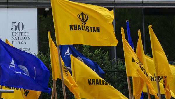 Khalistan flags fly as Sikhs for Justice hold a march and rally at the United Nations Headquarters on Indian Independence day, highlighting the human rights abuses of Sikhs in Punjab by Indian Prime Minister Narendra Modi's government August 15, 2019 in New York. - Sputnik International