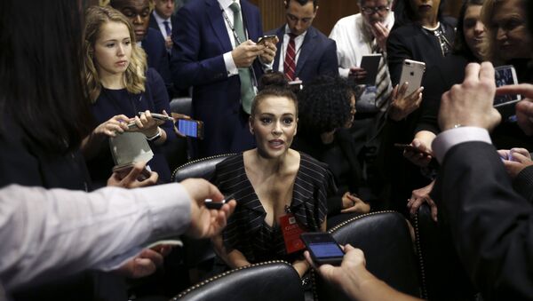Actress Alyssa Milano talks to the media after she arrived for the Senate Judiciary hearing on Capitol Hill in Washington, Thursday, Sept. 27, 2018 - Sputnik International