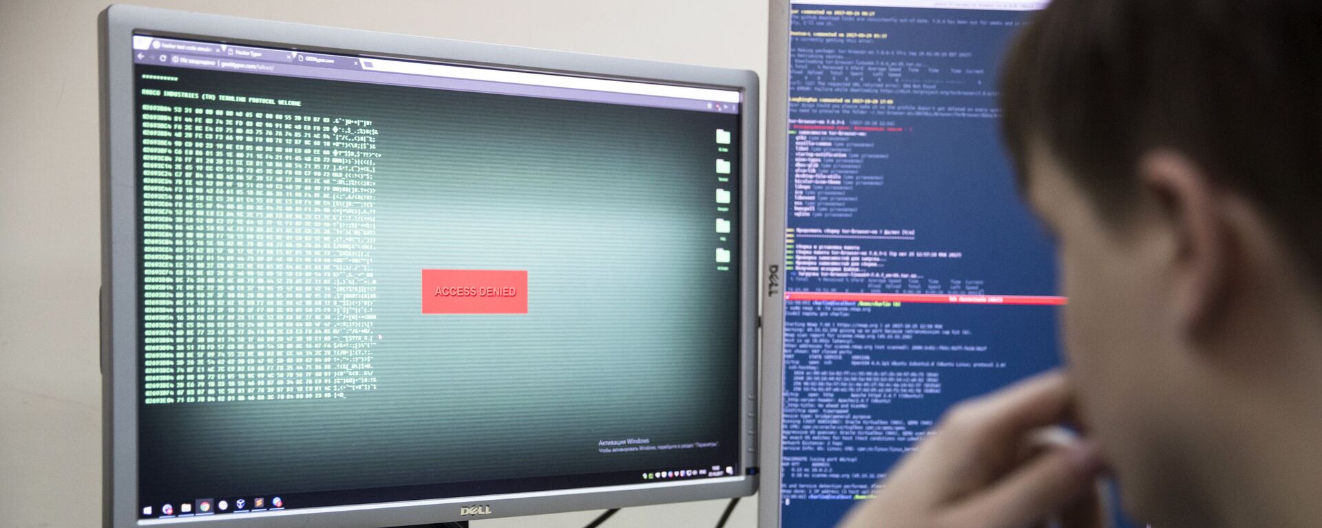 An employee of Global Cyber Security Company Group-IB develops a computer code in an office in Moscow, Russia, Wednesday, Oct. 25, 2017. A new strain of malicious software has paralyzed computers at a Ukrainian airport, the Ukrainian capital's subway and at some independent Russian media. Moscow-based Global Cyber Security Company Group-IB said in a statement Wednesday the ransomware called BadRabbit also tried to penetrate the computers of major Russian banks but failed. None of the banks has reported any attacks.  - Sputnik International, 1920, 02.09.2021