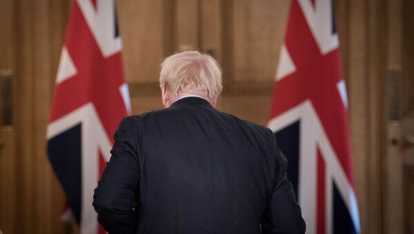 Britain's Prime Minister Boris Johnson is seen at the end of a virtual news conference on the ongoing situation with the coronavirus disease (COVID-19), at Downing Street, London, Britain September 9, 2020.  - Sputnik International