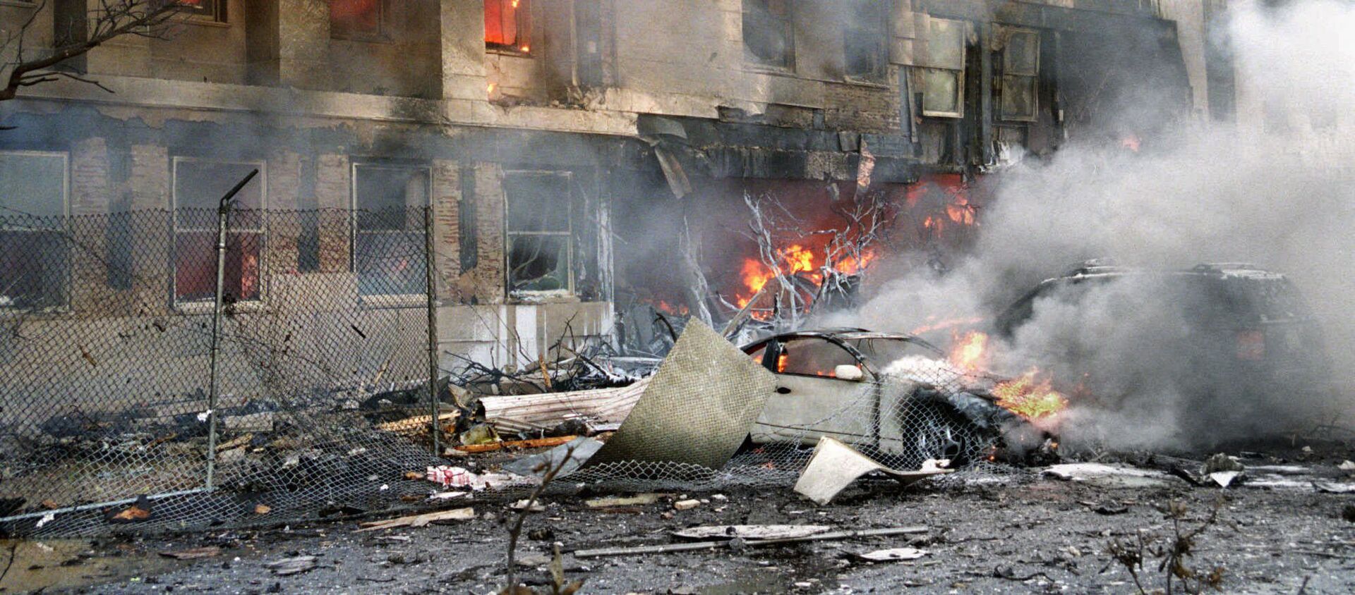 In this 11 September 2001 file photo, damage to the outer ring of the Pentagon is shown after a hijacked airliner crashed into the building - Sputnik International, 1920