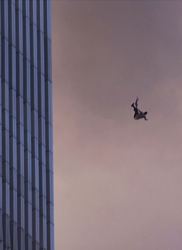 A person falls to his death from the World Trade Center after two planes hit the Twin Towers on 11 September 2001, in New York City - Sputnik International