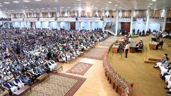 In this handout file photo taken on August 9, 2020 and released by the Press Office of President of Afghanistan, Afghan people attend on the last day of the Loya Jirga, a grand assembly, at the Loya Jirga Hall in Kabul. - Sputnik International