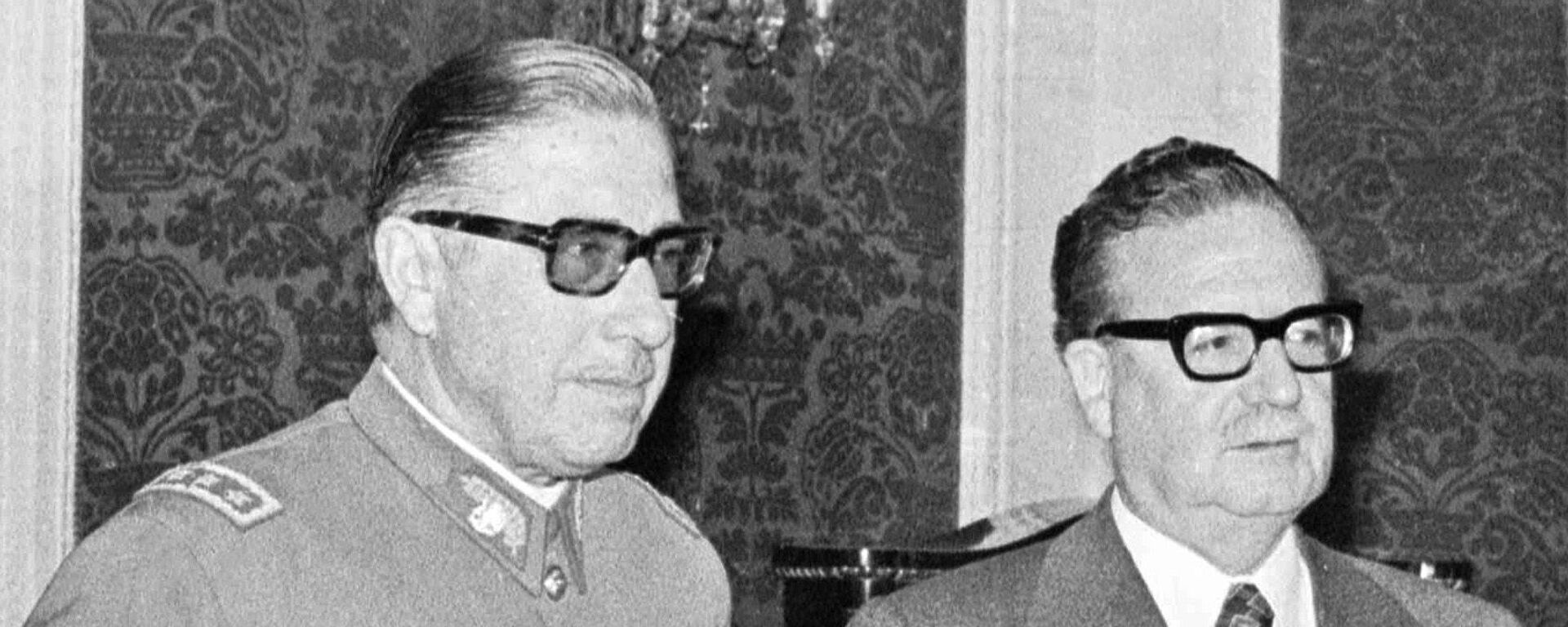 In this Aug. 23, 1973 file photo, Chilean Gen. Augusto Pinochet, left, and President Salvador Allende, attend a ceremony naming Pinochet as commander in chief of the Army. Chile marks the 45th anniversary of the coup led by Pinochet overthrowing Allende, on Wednesday, Sept. 11, 2018. - Sputnik International, 1920, 06.01.2026