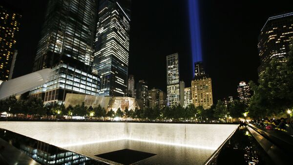 The Tribute in Light is seen in the sky above the National September 11 Memorial at the World Trade Center site on the 16th anniversary of the Sept. 11 terror attacks, Monday, Sept. 11, 2017, in New York. Two giant towers of light have lit up the lower Manhattan skyline as a visual memorial to those who lost their lives on 9/11 - Sputnik International