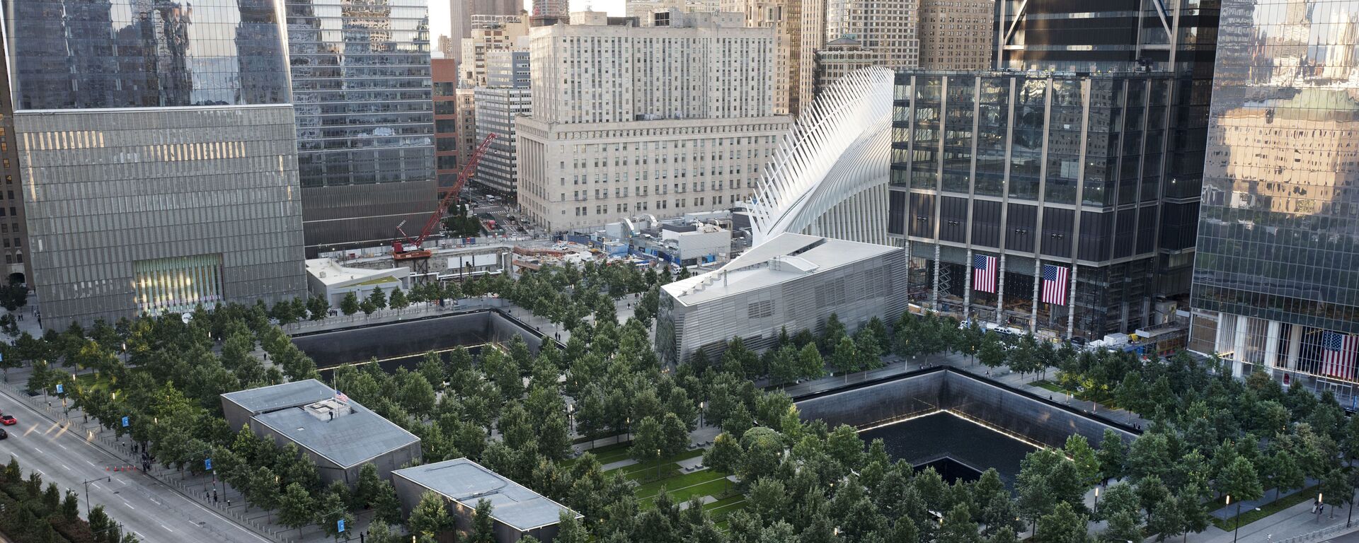 The National September 11 Memorial and Museum are set for a memorial service, Monday, Sept. 11, 2017, in New York. Thousands of 9/11 victims' relatives, survivors, rescuers and others are expected to gather Monday at the World Trade Center to remember the deadliest terror attack on American soil. Nearly 3,000 people died when hijacked planes slammed into the trade center, the Pentagon and a field near Shanksville, Pa., on Sept. 11, 2001.  - Sputnik International, 1920, 08.09.2021