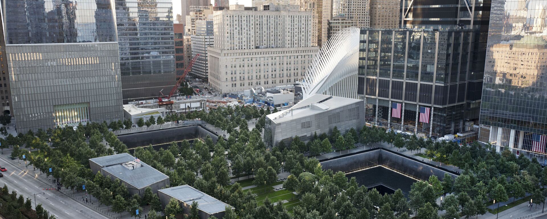 The National September 11 Memorial and Museum are set for a memorial service, Monday, Sept. 11, 2017, in New York. Thousands of 9/11 victims' relatives, survivors, rescuers and others are expected to gather Monday at the World Trade Center to remember the deadliest terror attack on American soil. Nearly 3,000 people died when hijacked planes slammed into the trade center, the Pentagon and a field near Shanksville, Pa., on Sept. 11, 2001.  - Sputnik International, 1920, 03.09.2021