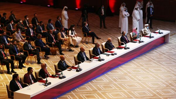 Delegates are seen before talks between the Afghan government and Taliban insurgents in Doha, Qatar September 12, 2020.  - Sputnik International