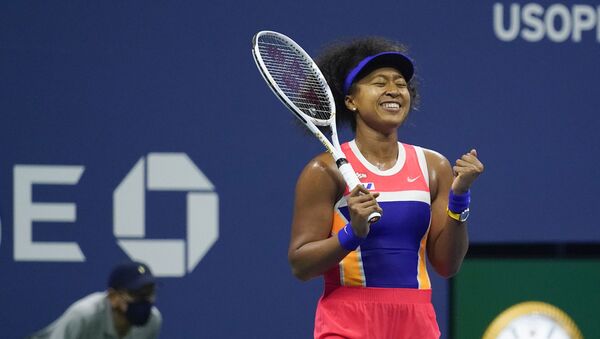 Naomi Osaka, of Japan, reacts after defeating Jennifer Brady, of the United States, during a semifinal match of the US Open tennis championships, Thursday, 10 September 2020, in New York - Sputnik International