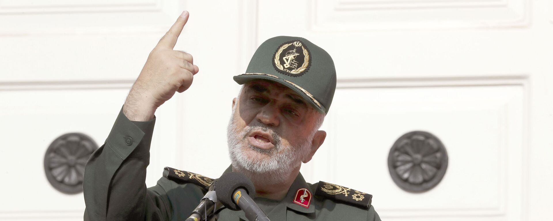 In this 2 November 2019 file photo, Chief of Iran's Revolutionary Guard Gen. Hossein Salami speaks in a ceremony to unveil new anti-U.S. murals painted on the walls of former U.S. embassy in Tehran, Iran. The chief of Iran's powerful Revolutionary Guard warned 27 January 2020,  that it will retaliate against American and Israeli commanders if the U.S. continues to threaten top Iranian generals. “I warn them to withdraw from this field,” Gen. Hossein Salami told state television, adding if they do not, they “will definitely regret it.”  - Sputnik International, 1920, 07.08.2021