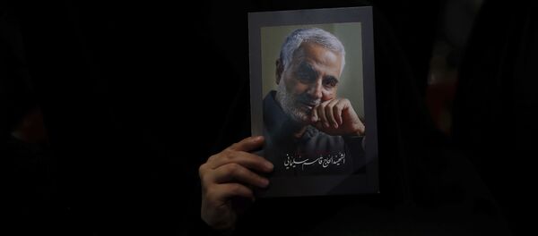 A Hezbollah supporter holds pictures of slain Iranian Revolutionary Guard Gen. Qassem Soleimani during a ceremony marking the anniversary of the assassination of Hezbollah leaders, Abbas al-Moussawi, Ragheb Harb and Imad Mughniyeh and the end of a 40-day Muslim mourning period for Soleimani, in the southern suburb of Beirut, Lebanon, Sunday, Feb. 16, 2020 A Hezbollah supporter holds pictures of slain Iranian Revolutionary Guard Gen. Qassem Soleimani during a ceremony marking the anniversary of the assassination of Hezbollah leaders, Abbas al-Moussawi, Ragheb Harb and Imad Mughniyeh and the end of a 40-day Muslim mourning period for Soleimani, in the southern suburb of Beirut, Lebanon, Sunday, Feb. 16, 2020 - Sputnik International