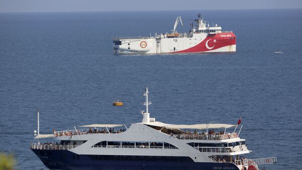 Turkey's research vessel, Oruc Reis, rear, anchored off the coast of Antalya on the Mediterranean, Turkey, Sunday, Sept. 13, 2020. Greece's Prime Minister Kyriakos Mitsotakis welcomed the return of a Turkish survey vessel to port Sunday from a disputed area of the eastern Mediterranean that has been at the heart of a summer stand-off between Greece and Turkey over energy rights. - Sputnik International