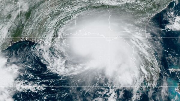 Hurricane Sally churning in the Gulf of Mexico in a satellite image released by the US' National Oceanic and Atmospheric Administration (NOAA) dated September 14, 2020.  - Sputnik International