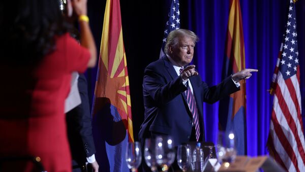 U.S. President Donald Trump gestures during a campaign event at the Arizona Grand Resort and Spa in Phoenix, Arizona U.S., September 14, 2020. - Sputnik International