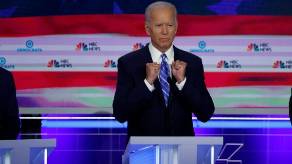 FILE PHOTO: Former Vice President Joe Biden gestures as he speaks during the second night of the first Democratic presidential candidates debate in Miami, Florida, U.S. June 27, 2019 - Sputnik International