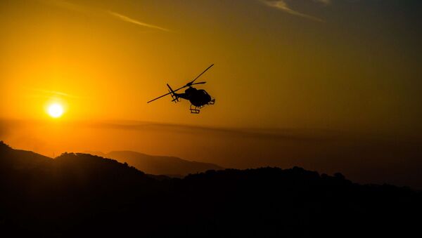Helicopter sunset - Sputnik International