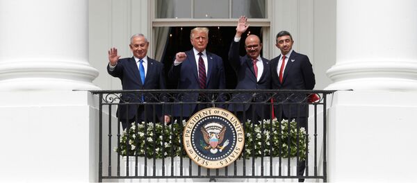 Israel's Prime Minister Benjamin Netanyahu, U.S. President Donald Trump, Bahrain's Foreign Minister Abdullatif Al Zayani and United Arab Emirates (UAE) Foreign Minister Abdullah bin Zayed wave and gesture from the White House balcony after a signing ceremony for the Abraham Accords, normalizing relations between Israel and some of its Middle East neighbors Israel's Prime Minister Benjamin Netanyahu, U.S. President Donald Trump, Bahrain's Foreign Minister Abdullatif Al Zayani and United Arab Emirates (UAE) Foreign Minister Abdullah bin Zayed wave and gesture from the White House balcony after a signing ceremony for the Abraham Accords, normalizing relations between Israel and some of its Middle East neighbors - Sputnik International