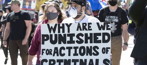 Gun supporters arrive on Parliament Hill during the Canadian Coalition for Firearm Rights during the pro-gun march in Ottawa, Ontario, on September 12, 2020. Gun supporters arrive on Parliament Hill during the Canadian Coalition for Firearm Rights during the pro-gun march in Ottawa, Ontario, on September 12, 2020. - Sputnik International