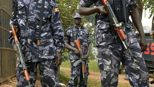 Ugandan police officers stand guard (File) - Sputnik International