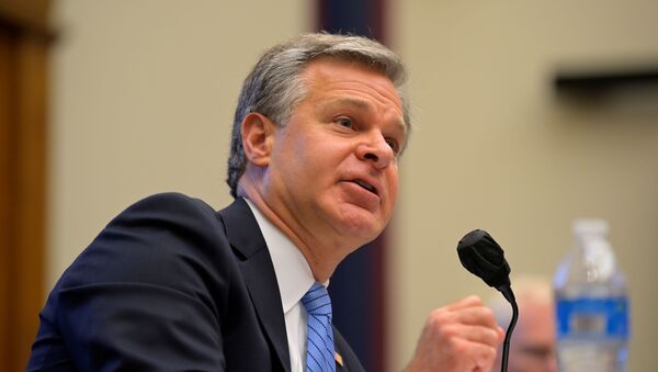 FBI director Christopher Wray testifies during a hearing about 'worldwide threats to the homeland' in the Rayburn House Office Building on Capitol Hill in Washington, U.S., September 17, 2020. - Sputnik International