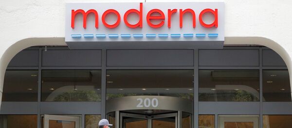 FILE PHOTO: A sign marks the headquarters of Moderna Therapeutics, which is developing a vaccine against the coronavirus disease (COVID-19), in Cambridge, Massachusetts, U.S., May 18, 2020 - Sputnik International