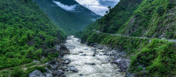 Kosi River flowing through valley, India Kosi River flowing through valley, India - Sputnik International