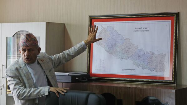 FILE - In this Tuesday, June 9, 2020, file photo, Nepal's Foreign Minister Pradeep Gyawali points to a map of Nepal during an interview with the Associated Press in Kathmandu, Nepal - Sputnik International