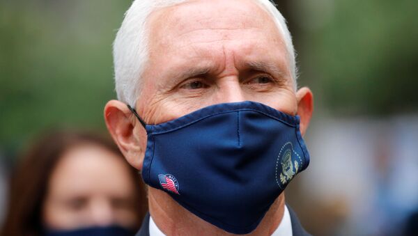U.S. Vice President Mike Pence wears a protective face mask because of the coronavirus disease (COVID-19) pandemic as he attends ceremonies marking the 19th anniversary of the September 11, 2001 attacks on the World Trade Center at the 911 Memorial & Museum in New York City, New York, U.S., September 11, 2020 - Sputnik International
