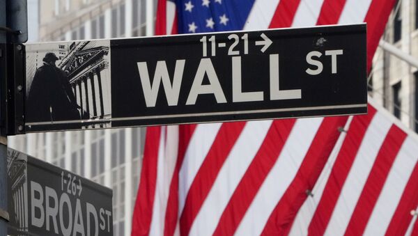 The Wall Street sign is pictured at the New York Stock exchange (NYSE) in the Manhattan borough of New York City, New York, U.S., March 9, 2020 - Sputnik International