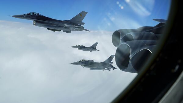 Belgian F-16A Fighting Falcons join up in formation alongside a B-52H Stratofortress, assigned to the 5th Bomb Wing at Minot Air Force Base, North Dakota, during the Bomber Task Force Europe mission, Allied Sky, on Aug. 28, 2020. Allied Sky was a single-day mission overflying 30 NATO nations and part of the routine Bomber Task Force missions that have occurred in the European theater of operations since 2018 with more than 200 sorties coordinated with Allies and partners. - Sputnik International