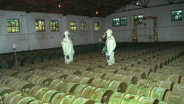 FILE - In this Saturday, May 20, 2000 file photo, two Russian soldiers make a routine check of metal containers with toxic agents at a chemical weapons storage site in the town of Gorny, 124 miles (200 kms) south of the Volga River city of Saratov, Russia - Sputnik International