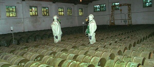 FILE - In this Saturday, May 20, 2000 file photo, two Russian soldiers make a routine check of metal containers with toxic agents at a chemical weapons storage site in the town of Gorny, 124 miles (200 kms) south of the Volga River city of Saratov, Russia FILE - In this Saturday, May 20, 2000 file photo, two Russian soldiers make a routine check of metal containers with toxic agents at a chemical weapons storage site in the town of Gorny, 124 miles (200 kms) south of the Volga River city of Saratov, Russia - Sputnik International