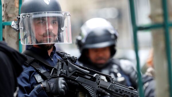A police officer is seen at the scene of an incident near the former offices of French magazine Charlie Hebdo, in Paris, France September 25, 2020 - Sputnik International