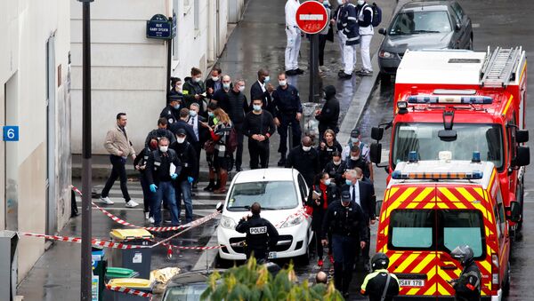 General view as police officers investigate the scene of an incident near the former offices of French magazine Charlie Hebdo, in Paris, France, 25 September 2020 - Sputnik International