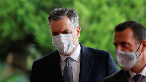 Newly appointed Lebanese Prime Minister Mustapha Adib wears a protective face mask as he arrives to attend a meeting with French President Emmanuel Macron at the presidential palace in Baabda, Lebanon September 1, 2020 - Sputnik International