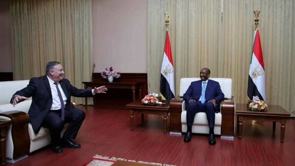 US Secretary of State Mike Pompeo, left, with General Abdel Fattah al-Burhan on his trip to Sudan in August 2020. - Sputnik International