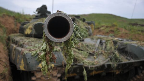 A T-64 tank of the Nagorno-Karabakh Defense Army on the first line of defense. - Sputnik International