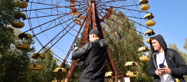Radioactive Excursion: Tourists Explore Chernobyl Exclusion Zone Radioactive Excursion: Tourists Explore Chernobyl Exclusion Zone - Sputnik International