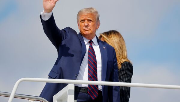 U.S. President Donald Trump and first lady Melania Trump board Air Force One as they depart Washington on campaign travel to participate in his first presidential debate with Democratic presidential nominee Joe Biden in Cleveland, Ohio at Joint Base Andrews, Maryland, U.S., September 29, 2020. - Sputnik International