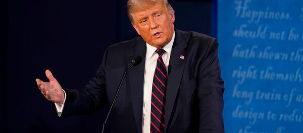 U.S. President Donald Trump participates in the first 2020 presidential campaign debate with Democratic presidential nominee Joe Biden (not pictured), held on the campus of the Cleveland Clinic at Case Western Reserve University in Cleveland, Ohio, U.S., September 29, 2020. - Sputnik International