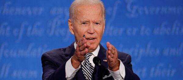 Democratic presidential nominee Joe Biden participates in the first 2020 presidential campaign debate with U.S. President Donald Trump, held on the campus of the Cleveland Clinic at Case Western Reserve University in Cleveland, Ohio, U.S., September 29, 2020. - Sputnik International