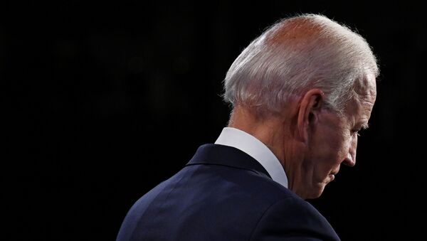 Democratic presidential nominee Joe Biden listens as he participates in the first 2020 presidential campaign debate with U.S. President Donald Trump held on the campus of the Cleveland Clinic at Case Western Reserve University in Cleveland, Ohio, U.S., September 29, 2020.  - Sputnik International