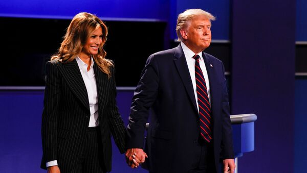US President Donald Trump and first lady Melania Trump leave the stage after the first 2020 presidential campaign debate with Democrat presidential nominee Joe Biden, on the campus of the Cleveland Clinic at Case Western Reserve University in Cleveland, Ohio, US, 29 September 2020. - Sputnik International